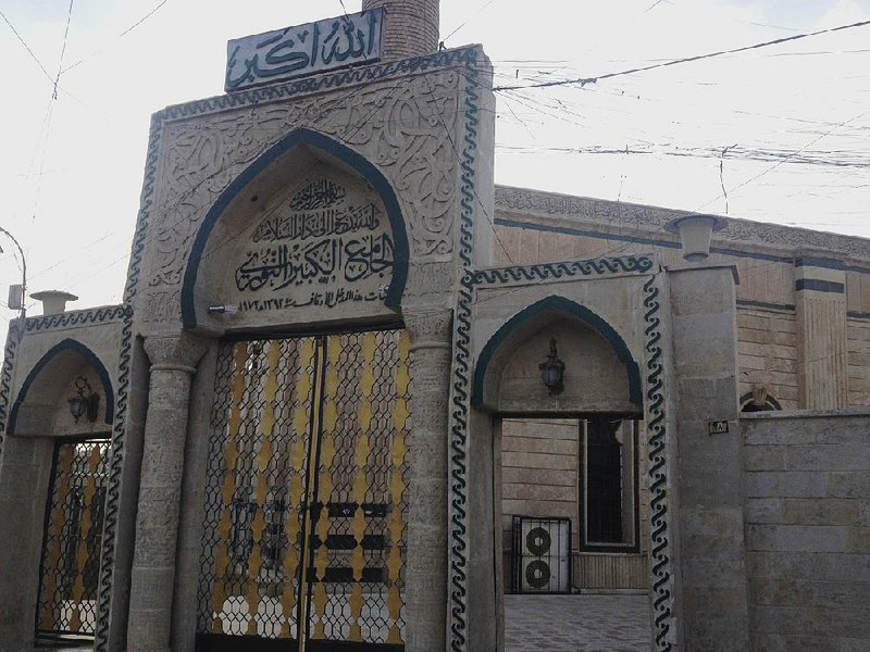 The gate of the al-Nuri mosque is seen in the northern city of Mosul, Iraq, in this 2014 file photo. 