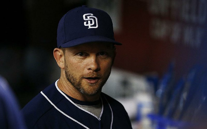 San Diego Padres' Andy Green paces in the dugout prior to a baseball game against the Arizona Diamondbacks Tuesday, June 6, 2017, in Phoenix. The Diamondbacks defeated the Padres 10-2. 