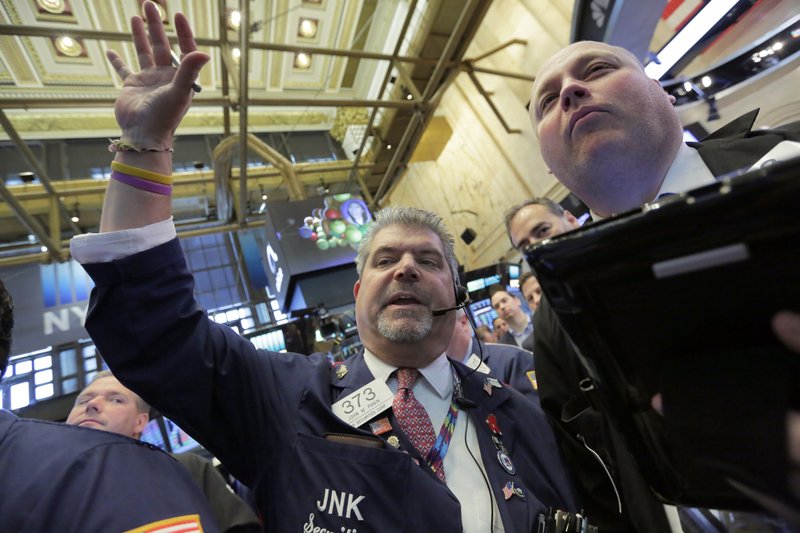 Traders John Panin, left, and Michael Casey work on the floor of the New York Stock Exchange, Thursday, June 22, 2017. 