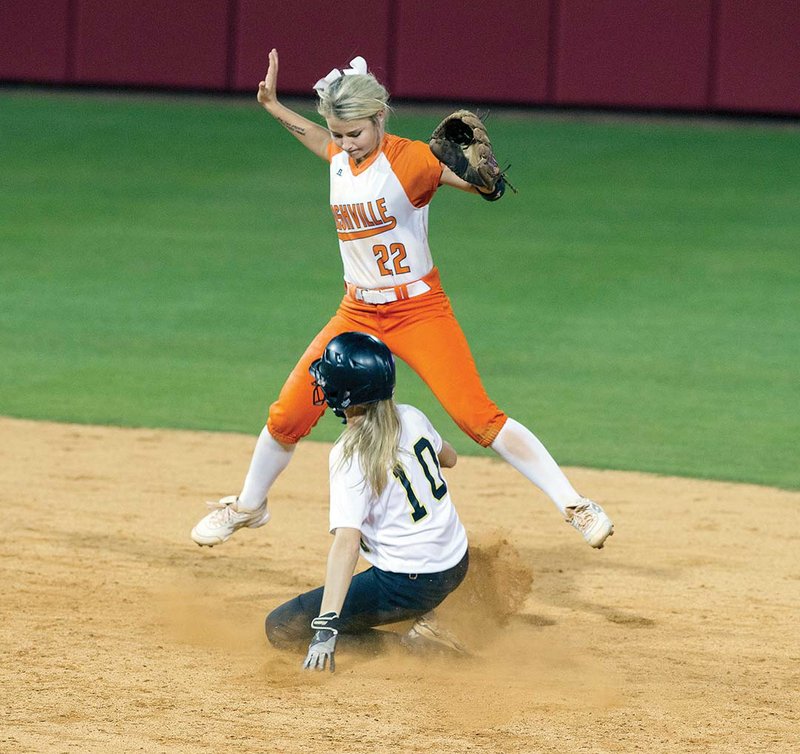 Aspen Campbell of Pottsville slides into the second base while Nashville shortstop Kaylea Carver tries to avoid contact during the Class 4A state-championship game May 19 at Bogle Park in Fayetteville. Campbell, 
who helped lead the Lady Apaches to an 11-3 win over the Scrapperettes, is the 2017 River Valley & Ozark Edition Softball Player of the Year.