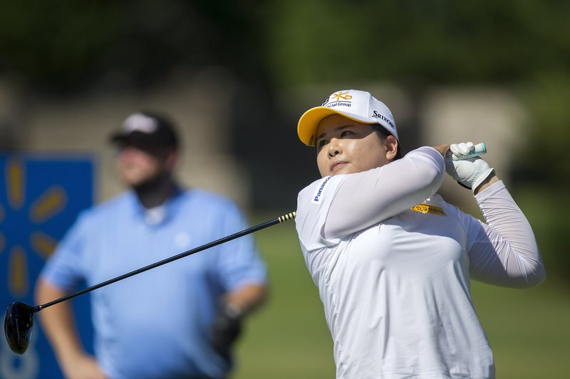 Inbee Park hits from the eighth tee box Wednesday with her pro-am group during the Walmart NW Arkansas Championship presented by P&G at Pinnacle Country Club in Rogers.