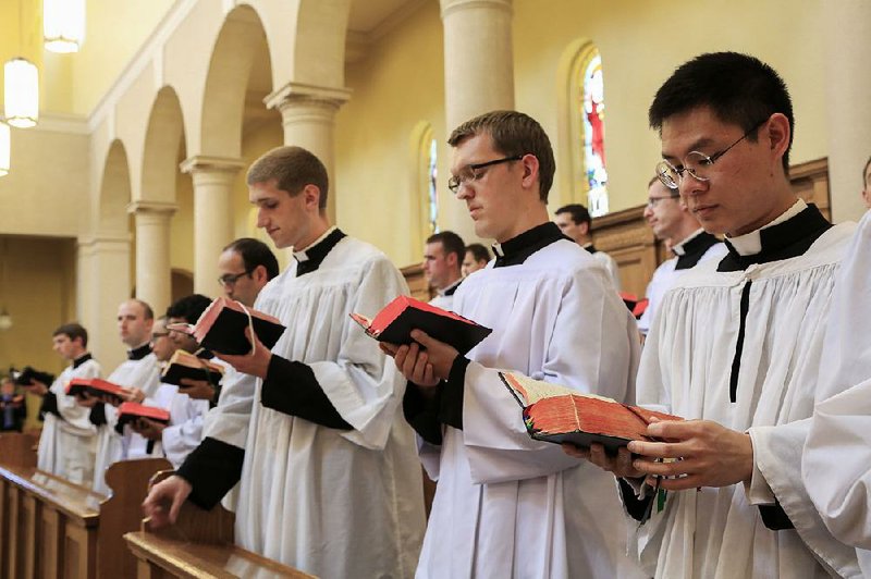 Members of the Priestly Fraternity of Saint Peter perform a Gregorian chant at Our Lady of Guadalupe Seminary in Denton, Neb. The seminarians sing a traditional Latin funeral Mass on their album, Requiem, which was released
in May.