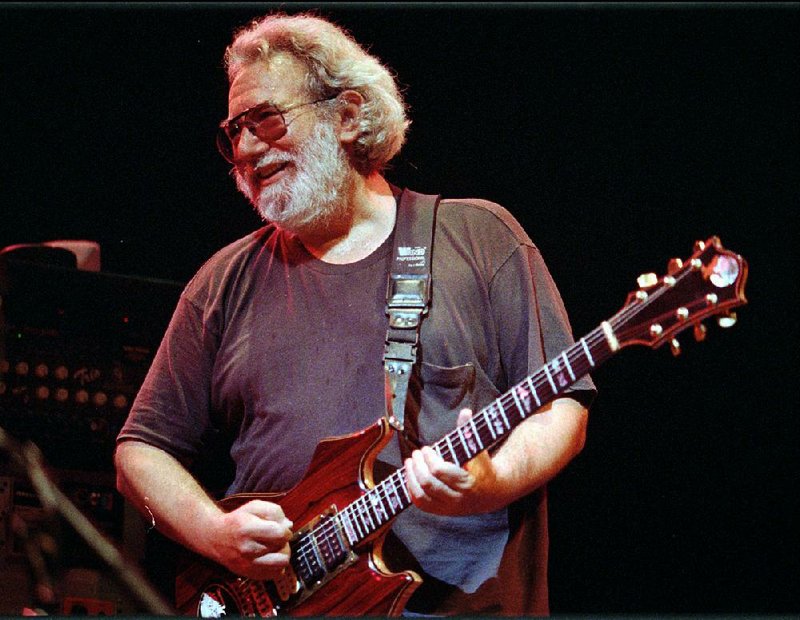 Grateful Dead lead guitarist and vocalist Jerry Garcia performs at the Oakland, Calif., Coliseum in 1992. 