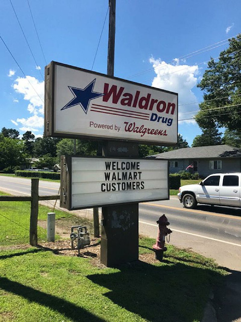 At Waldron Drug, employees have added space and chairs to serve the departing Wal-Mart’s customers.