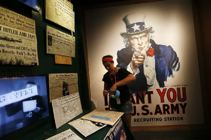 Posters, newspapers and videos help tell the story of everyday life in “Salute to the Home Front,” the new permanent exhibit at the National World War II Museum in New Orleans. 