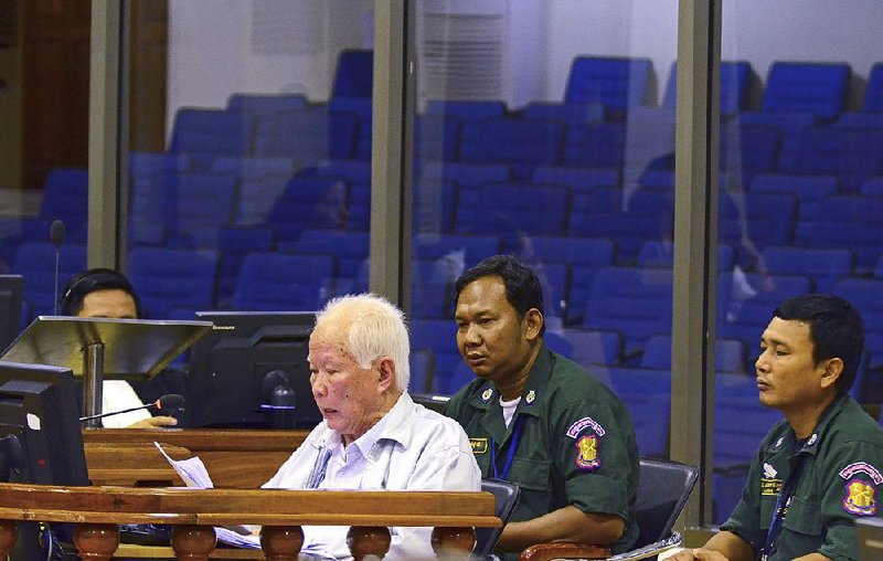 Khieu Samphan, the Paris-educated intellectual who served as the Khmer Rouge head of state in the 1970s, sits in court during the war-crimes tribunal in Phnom Penh, Cambodia. 