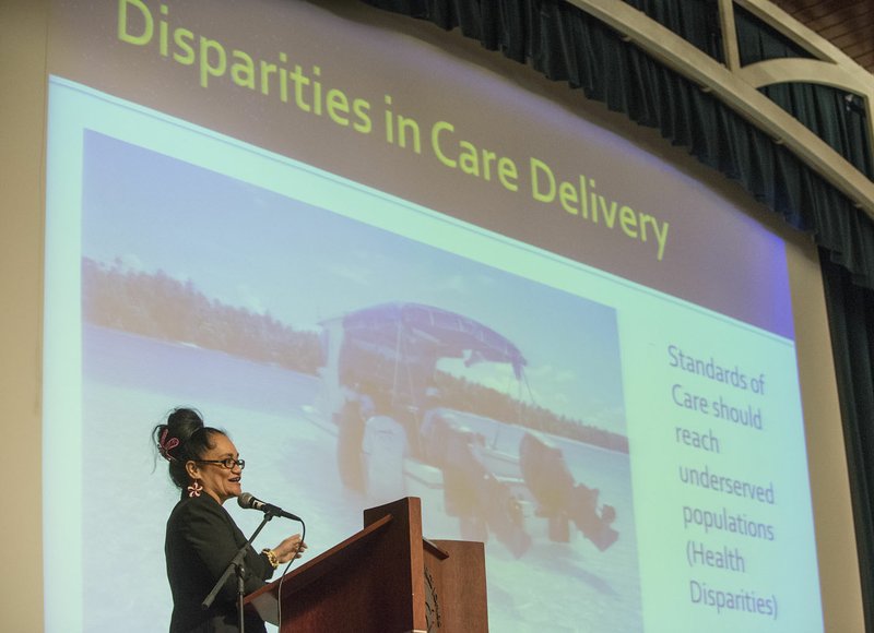 File Photo/NWA Democrat-Gazette/ANTHONY REYES  • @NWATONYR Dr. Nia Aitaoto speaks Nov. 13, 2014, at a health forum at the Jones Center in Springdale. The forum was sponsored by UAMS Northwest and explored issues affecting the Marshallese population in the United States including health disparities, cultural understanding and social policy.