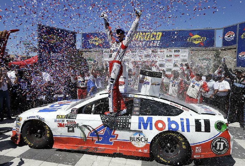 Kevin Harvick managed to earn his first victory of the season and clinched a spot in the NASCAR playoffs in the process. Harvick held off racing teammate Clint Bowyer to win the Toyota Save/Mart 350 on Sunday at Sonoma Raceway in Sonoma, Calif.
