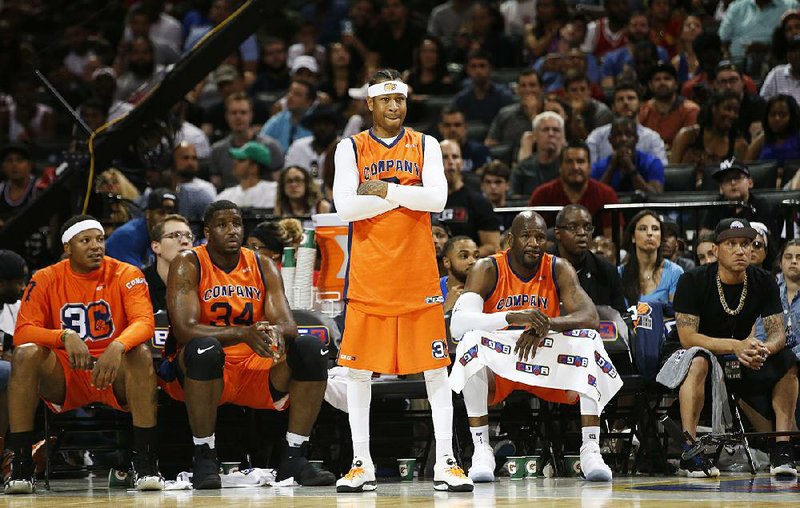 Allen Iverson, a player-coach for 3’s Company, one of eight teams in the inaugural season of the Big3, watches
his team Sunday in New York. The Big3 is a 3-on-3 basketball league led by rapper and actor Ice Cube. Iverson,
42, played nine minutes in his team’s 61-51 victory over the Ball Hogs.