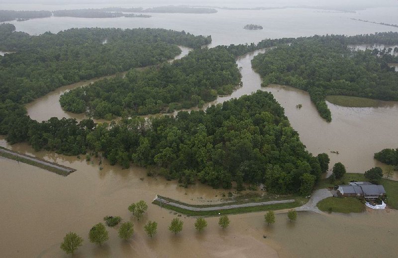 Officials are developing plans for emergency repairs to levees near Pocahontas that were breached by floodwaters from the Black River as shown in this photo from May 4.