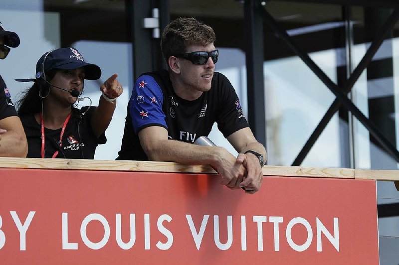 Emirates Team New Zealand Helmsman Peter Burling looks on before a Red Bull Youth America's Cup awards ceremony Wednesday, June 21, 2017, in Hamilton, Bermuda. Emirates Team New Zealand faces Oracle Team USA in more America's Cup sailing competition this weekend. 