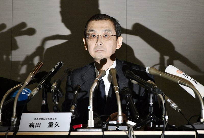 Japanese air bag maker Takata Corp. CEO Shigehisa Takada speaks Monday during a news conference in Tokyo to announce that the company had filed for bankruptcy protection in Japan and the United States.