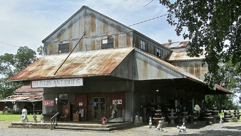 A prominent structure in Keo Commercial Historic District houses Old Gin Antiques.