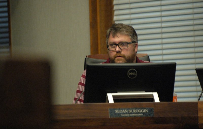 Sloan Scroggin, planning commissioner, speaks Monday during a Fayetteville Planning Commission meeting at City Hall. 