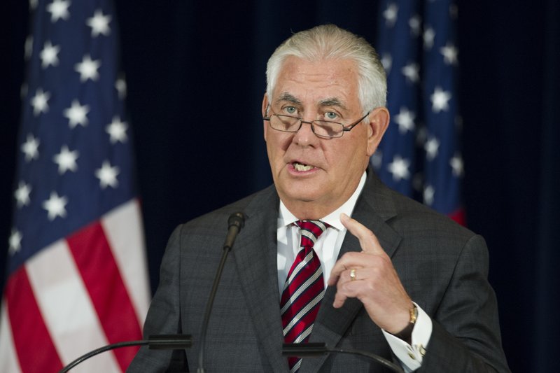 FILE - In this June 21, 2017 file photo, Secretary of State Rex Tillerson speaks at the State Department in Washington. The Trump administration is poised to declare China among the world&#x2019;s worst offenders on human trafficking, U.S. officials said Monday, June 26, 2017, putting the world&#x2019;s most populous country in the same category as North Korea, Zimbabwe and Syria, China&#x2019;s downgrade is to be announced Tuesday, June 27, 2017, at the State Department when Tillerson unveils the annual Trafficking in Persons Report to Congress. (AP Photo/Cliff Owen, File)