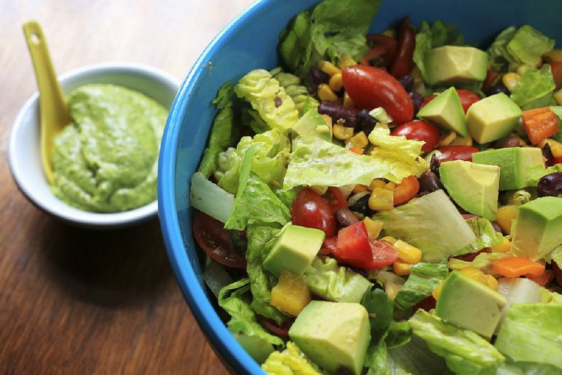 Southwestern Chopped Salad includes lettuce, beans and fresh vegetables in a flavor-packed cilantro-lime-avocado dressing.
