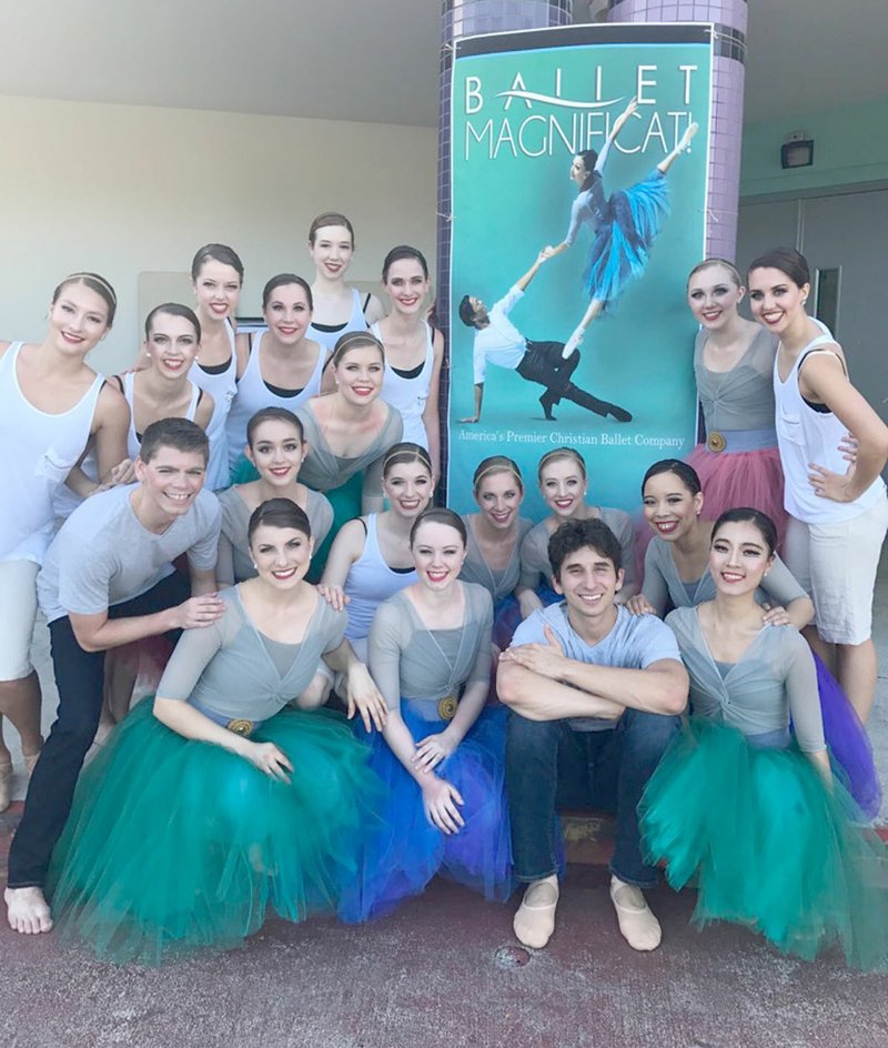 Photo submitted Ballet Magnificat! traveled to Guam, South Korea and China for a tour in March. In this picture they are in front of a banner in Guam and Siloam Springs native Taylor Stewart is on the middle row, second from the right.