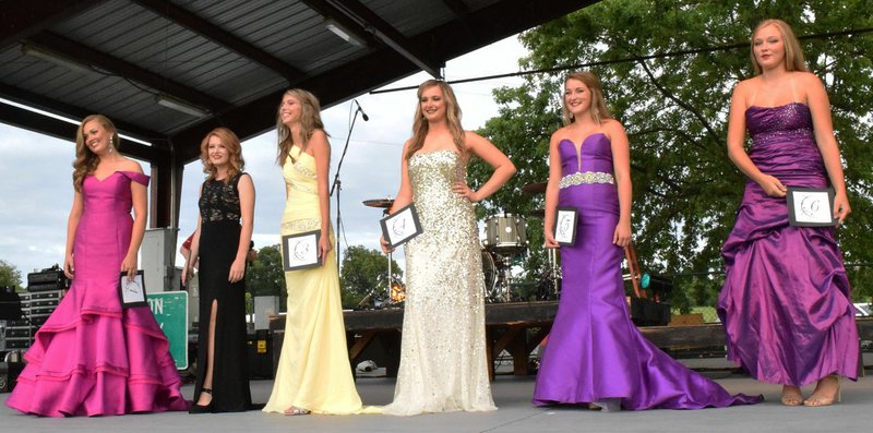 Photo by Mike Eckels Contestants waited on stage at Veterans Park for the crowning of the 2016 Miss Decatur Barbecue in Decatur on Aug. 6, 2016. The deadline to enter the 2017 contest will be August 1.