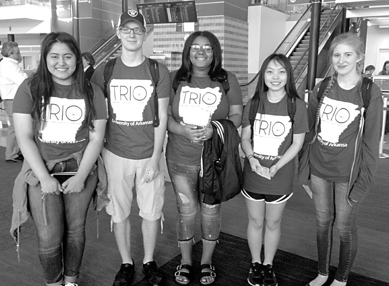 Submitted Photo Pictured at the airport are Alexia Lo (second from right) and John Long (second from left) from Gentry High School, along with Alaina Brown from McDonald County High School, Ashley Hart from Northside High School and Aridai Araujo from Springdale High School.