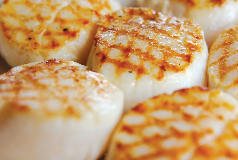 Scallops cook quickly on the grill, leaving plenty of time for friends, family and fun on the Fourth of July.
