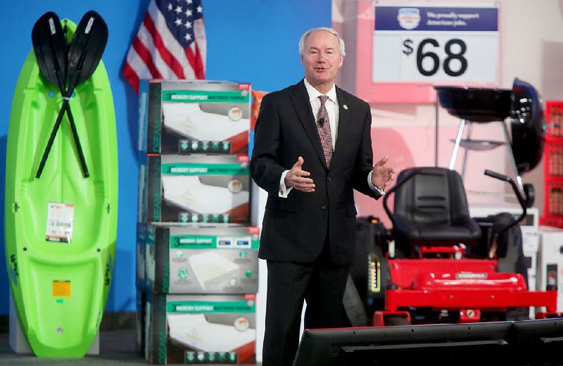 Gov. Asa Hutchinson speaks Wednesday during Wal-Mart’s annual Open Call event where entrepreneurs pitch their ideas to the retail giant. The governor said he sees the event as a recruiting tool for businesses. 