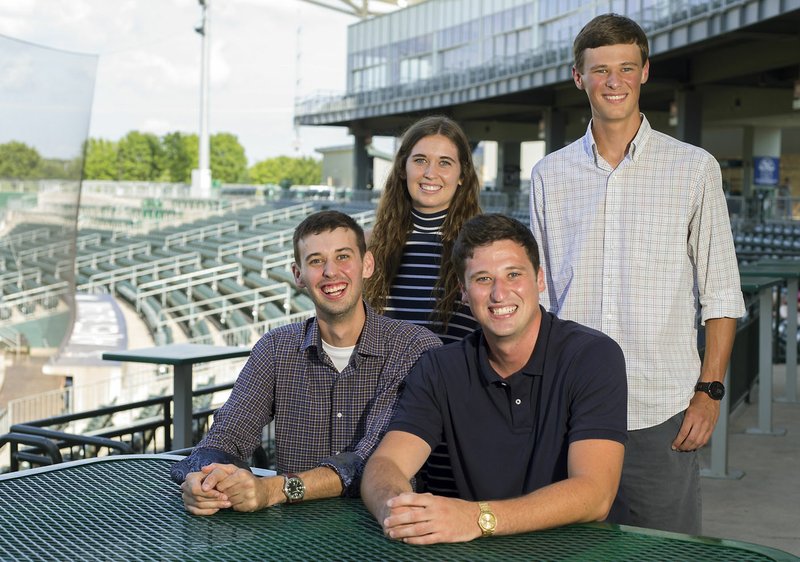 NWA Democrat-Gazette/JASON IVESTER Siblings Marc (from left), Sara, Evan and Ryan Giesen have all worked for the Northwest Arkansas Naturals since they came to Springdale in 2008. Marc and Evan started the family tradition in 2008, while Ryan and Sara still work there today. The Naturals are in their 10th season and at least one Giesen has worked at Arvest Ballpark in every season.