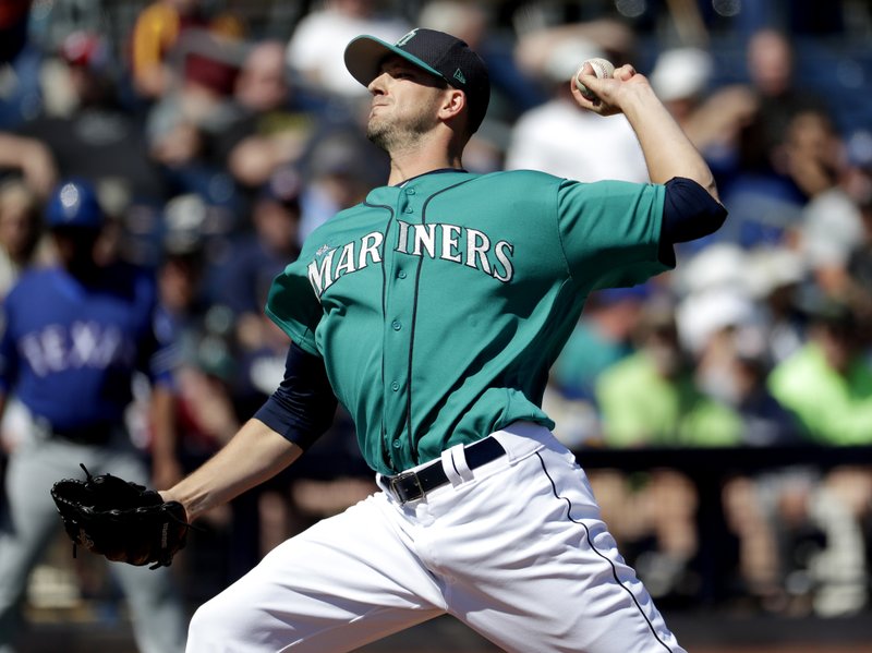In this March 6, 2017, file photo, Seattle Mariners starting pitcher Drew Smyly throws against the Texas Rangers during the first inning of a spring training baseball game, in Peoria, Ariz. Smyly will undergo Tommy John surgery after being diagnosed with a torn ulnar collateral ligament. Seattle announced the diagnosis on Wednesday, June 28, 2017, ending Smyly's hopes of returning during the 2017 season. 