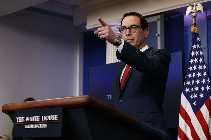 Treasury Secretary Steve Mnuchin takes a question Thursday during the daily press briefing in Washington. When asked about Congress acting on the debt ceiling, Mnuchin said, “For the benefit of everybody, the sooner that they do this, the better.”