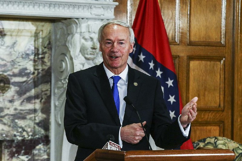 Gov. Asa Hutchinson talks about his suggestions to improve the federal health care bill during a news conference Thursday at the Capitol in Little Rock.