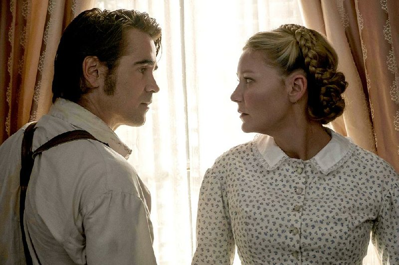 Wounded Union soldier Cpl. John McBurney (Colin Farrell) draws the attentions of girls school teacher Edwina (Kirsten Dunst) in Sofi a Coppola’s The Beguiled, a remake of the 1971 Clint Eastwood film.