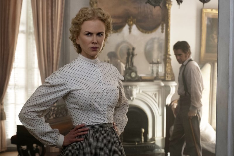 This image released by Focus Features shows Nicole Kidman, left, and Colin Farrell in a scene from "The Beguiled" 