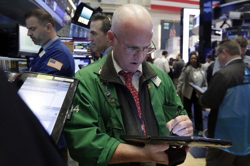 Trader Kevin Walsh works on the floor of the New York Stock Exchange, Thursday, June 29, 2017. U.S. stock indexes moved lower in early trading Thursday, giving up some of their gains from the day before. (AP Photo/Richard Drew)