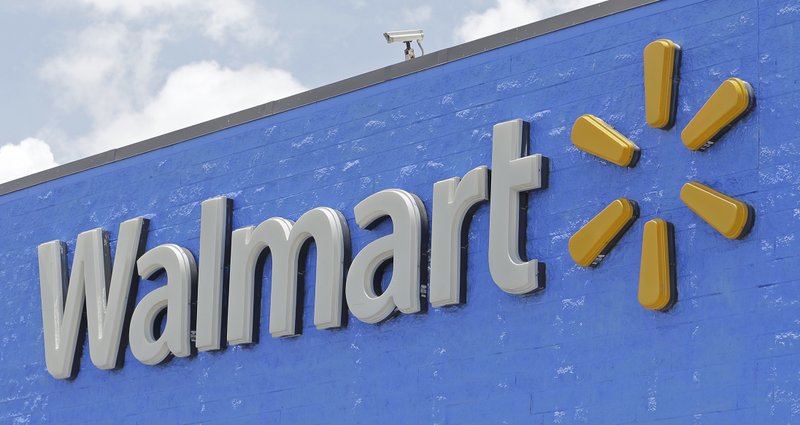 This Thursday, June 1, 2017, photo, shows a Walmart sign at a store in Hialeah Gardens, Fla.  (AP Photo/Alan Diaz)