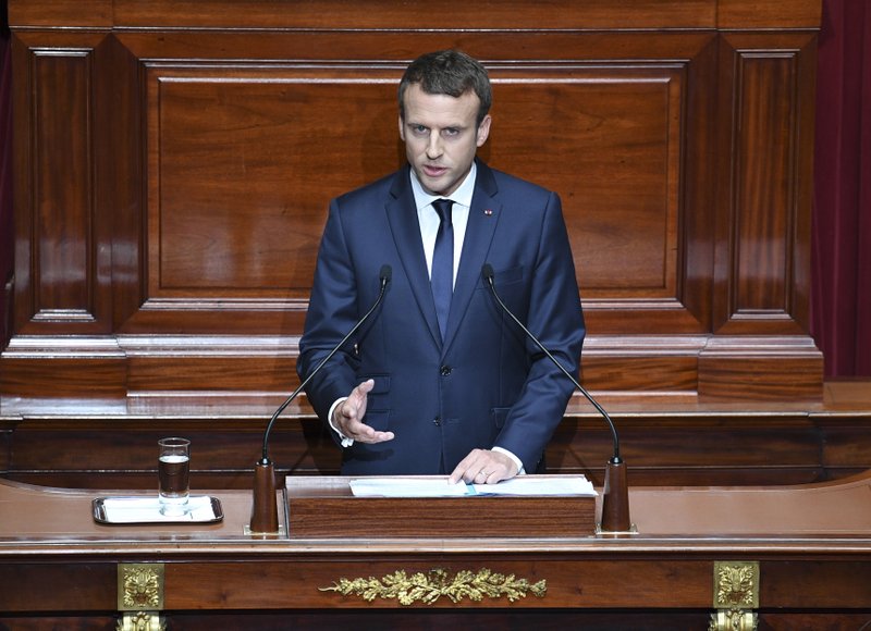 French President Emmanuel Macron speaks during a special congress gathering both houses of parliament (National Assembly and Senate) in the palace of Versailles, outside Paris, Monday, July 3, 2017. Macron will lay out his political, security and diplomatic priorities at an extraordinary joint session of parliament at the chateau of Versailles. (Eric Ferferberg/Pool Photo via AP)