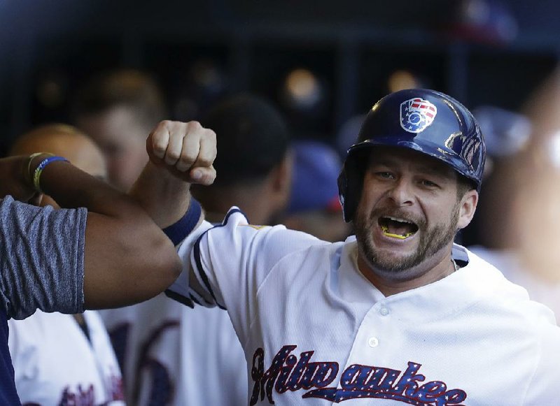 Milwaukee Brewers' Stephen Vogt celebrates his two-run home run during the second inning of a baseball game against the Baltimore Orioles Tuesday, July 4, 2017, in Milwaukee. 