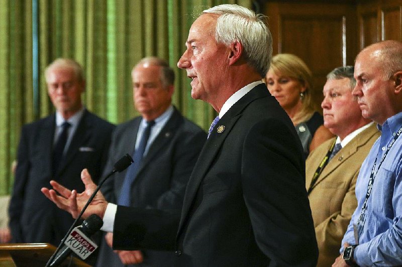 “The looming cloud of violence harms us all — not just Little Rock, but the entire state,” Gov. Asa Hutchinson said Thursday in announcing a new anti-crime investigative group. 