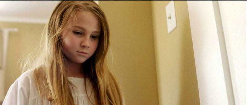 Young Claire (Lauren Lasseigne) has some difficult information to impart in the independently produced psychological thriller It Knows.
