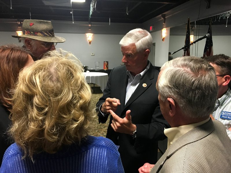 U.S. Rep. Steve Womack, R-Ark., talks Friday with members of the Political Animals Club of Northwest Arkansas after speaking to the group over lunch in Fayetteville. He said the Republican Party in Congress hasn’t yet “learned how to govern,” stalling its plans to change taxes and health care policy.