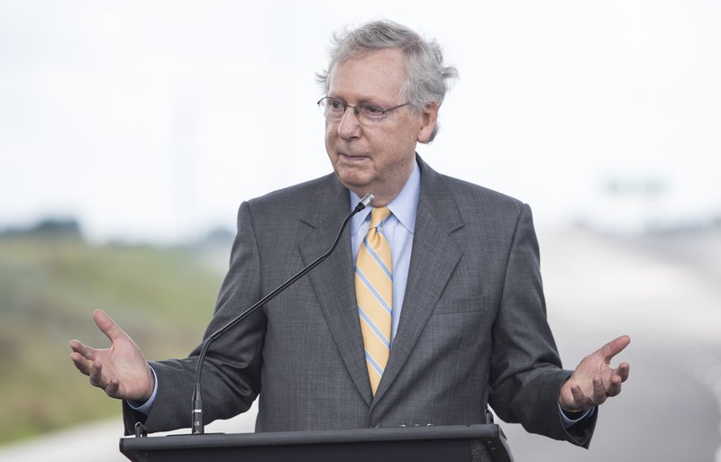 U.S. Sen. Mitch McConnell, R-Ky., speaks during a news conference for the ribbon cutting ceremony for exit 30 on Interstate 65 in Bowling Green, Ky., on Thursday, July 6, 2017. (Austin Anthony/Daily News via AP)