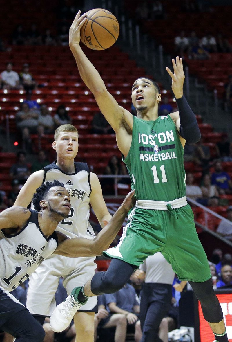 Jayson Tatum scored 27 points and had 11 rebounds to lead the Boston Celtics to an 86-81 victory over the Los Angeles Lakers on Saturday night in the NBA Summer League.