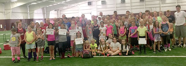 Photo submitted More than 90 girls from Arkansas, including some from Siloam Springs, along with Oklahoma, Missouri and Kansas came to Gentry to participate in a two-day fundraiser camp June 22-23 for a member of the softball community who recently suffered a medical setback. More than $2,500 was raised and all proceeds went directly to helping the family. Businesses involved were Pioneer Pizza providing lunch, Harps donating bottled water, McKee Foods donating snacks, Gentry Conversion Charter Schools providing maintenance, transportation, lunch, facilities and equipment, Sno Paradise provided a cold treat and Joni Wilson provided T-shirts. Camp instructors included: Ayla Smartt, Lance Nations, Beau Collins, Justin Ledbetter, Shawn Haag, Clay Stewart, Paul Ernest, Kyle Jordan, Joe Still, Brooke Boston, Makensie Sweeten, Lali Estrada, April Harris and Taylor Hull. Player assistants were Alyssa Kelton, Billi Taylor, Lynzey Sikes, Allee Sweeten and Raegan Jude. Administrative assistants were Jennifer Ernest, Tonya Sweeten, Shelly Sikes, Leonna Taylor, Stacy Nations, and Gentry athletic director Brae Harper and Dean of students Brian Little.