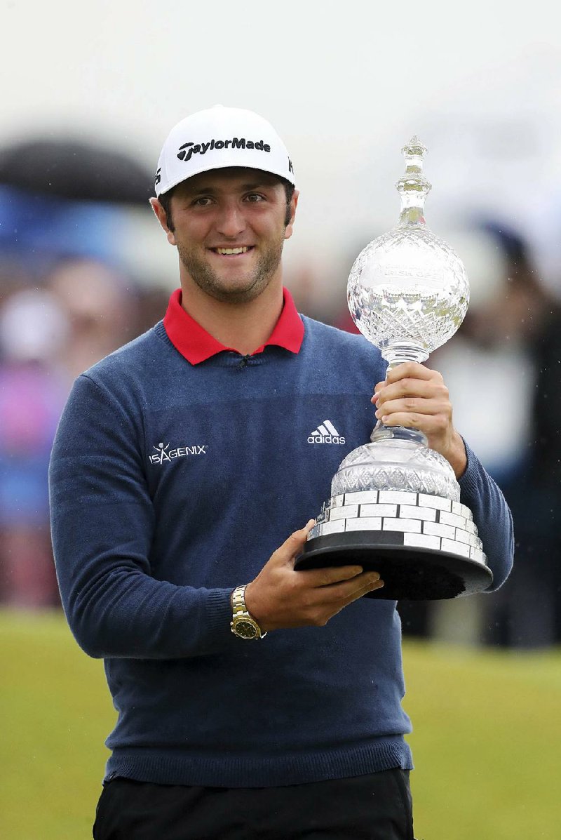 Spain’s Jon Rahm avoided a penalty in Sunday’s final round of the Irish Open when rules officials determined
he did not attempt to break the rules when TV viewers thought he placed his ball in front of the marker on the
sixth green. Rahm went on to win the tournament by six strokes.