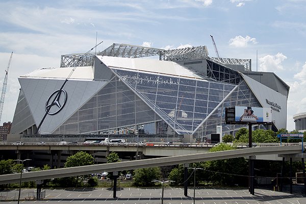 Mercedes Benz Stadium, the new stadium for the Atlanta Falcons NFL football team, sits under construction in Atlanta, Wednesday, May 17, 2017. (AP Photo/David Goldman)

