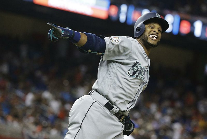 Second baseman Robinson Cano of Seattle rounds the bases after hitting a tie-breaking home run in the top of the 10th inning to give the American League a 2-1 victory over the National League in the MLB All-Star Game on Tuesday night at Marlins Park in Miami. Cano was named the game’s MVP as the American League won for the 17th time in the past 21 years.