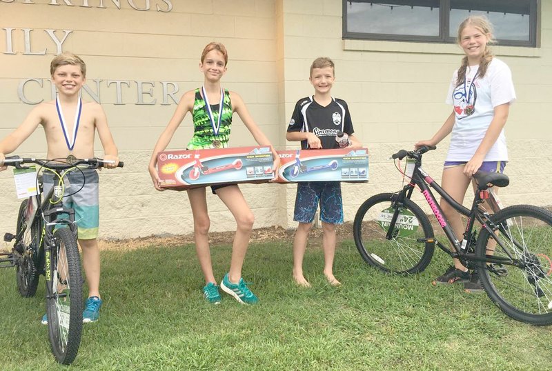 Photo submitted Pictured are the winners of the 11-and 12-year-old division of the Kids Triathlon held at the Family Aqautic Center. Pictured are winners: Girls, first place Isabelle Pastoor and second place Amy Blaha; boys, first place Jackson Bellomy and second place Grayson Manning.