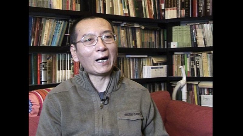 In this file image taken from a Jan 6, 2008, video, Liu Xiaobo speaks during an interview in his home in Beijing, China. The hospital treating ailing Chinese Nobel Peace laureate Liu says his condition is now critical and doctors are in "active rescue" mode for China's best-known political prisoner.