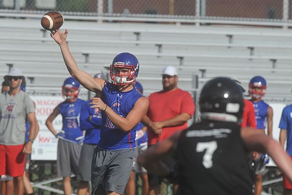 Bixby quarterback Tanner Griffin releases a pass Saturday, July 16, 2016, during the championship game of Southwest Elite 7-on-7 tournament at Champions Stadium at Shiloh Christian in Springdale.