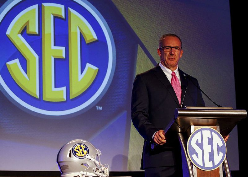 Conference Commissioner Greg Sankey speaks during the NCAA college football Southeastern Conference's annual media gathering, Monday, July 10, 2017, in Hoover, Ala. (AP Photo/Butch Dill)