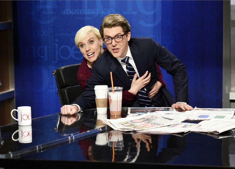 Kate McKinnon of NBC’s Saturday Night Live performs a skit with Alex Moffat as cable talk-show hosts Mika Brzezinski and Joe Scarborough. McKinnon helped lead the show to 22 Emmy Award nominations.