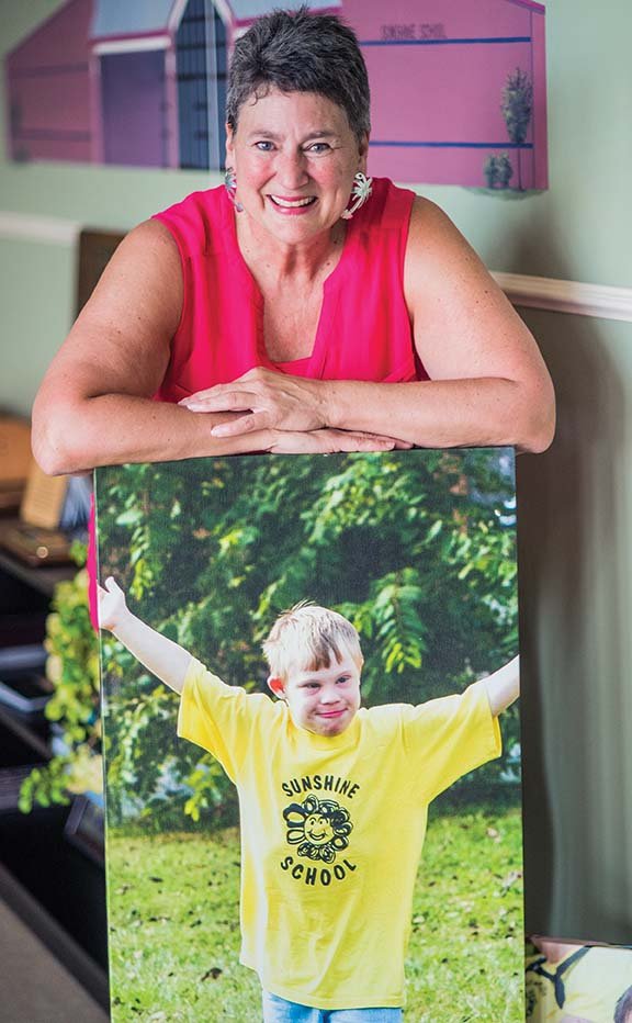 Sally Paine stands in The Sunshine School in Searcy. Paine said she learns life lessons about courage and determination from the students every day.